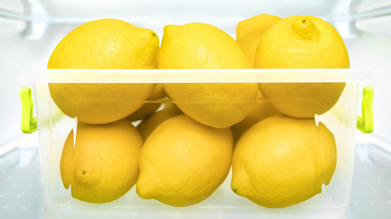 Whole lemons stored in a home refrigerator