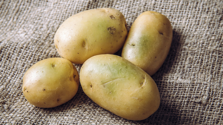 Potatoes with green spots