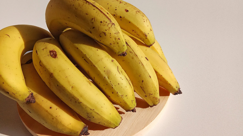 Bananas on wooden plate