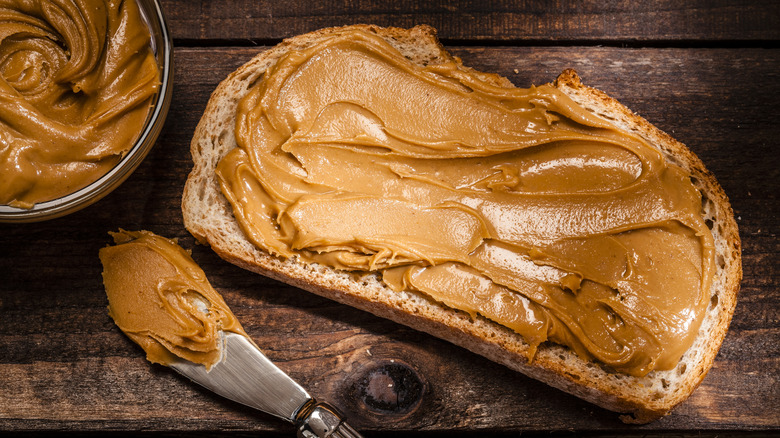 Peanut butter on a slice of toast