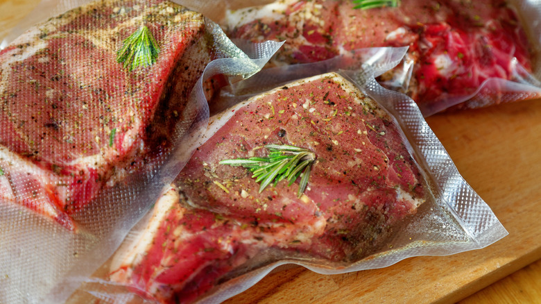 Vacuum-sealed pork chops with rosemary