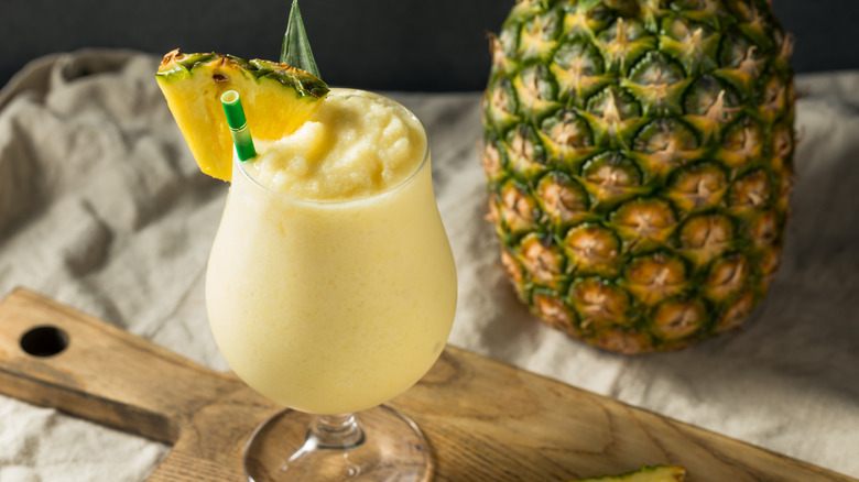 Frozen pina colada cocktail with pineapple