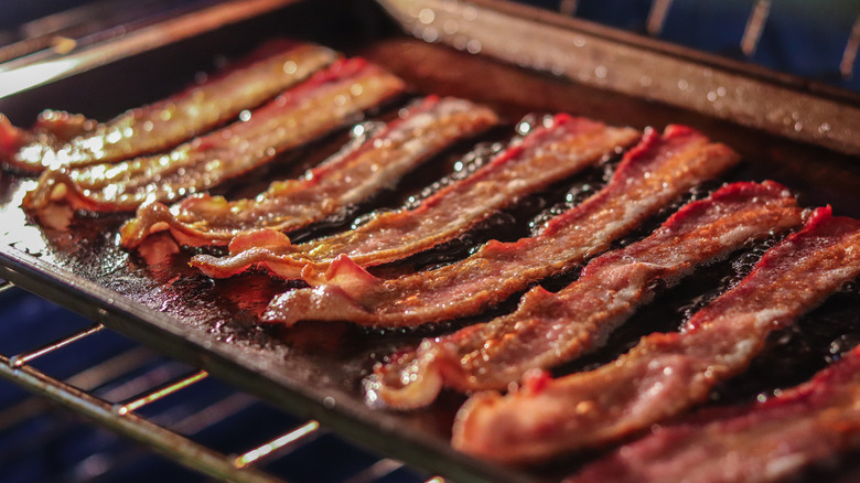 crispy bacon on a baking sheet in an oven