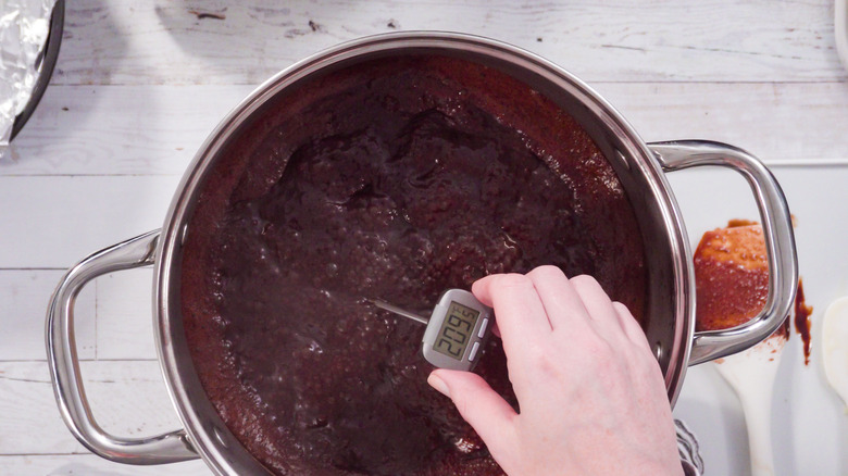 Fudge cooking with candy thermometer