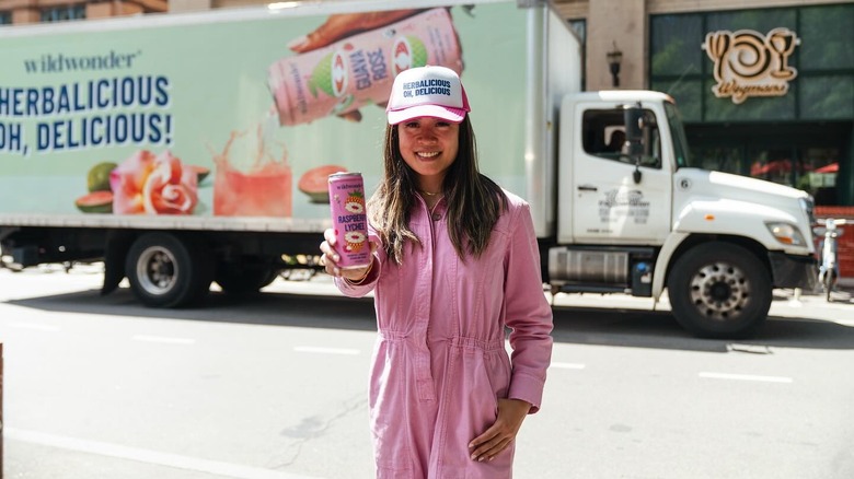 Rosa Li holds a can of wildwonder