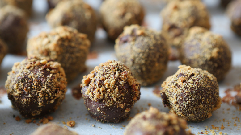 Handmade bourbon balls with a crushed nut coating