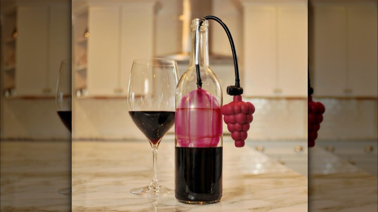 wine glass and bottle with Air Cork in it