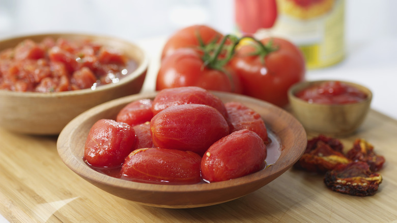 Tomato sauce in pan with ingredients