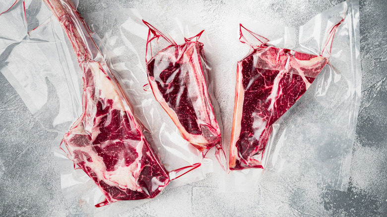 Frozen steak in vacuum sealed bag