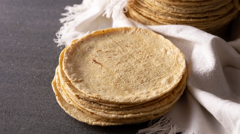 Stacks of homemade corn tortillas