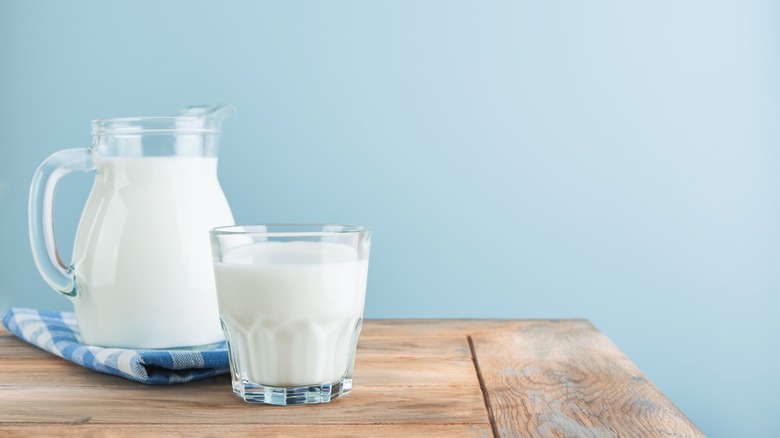 A jug and a glass of milk