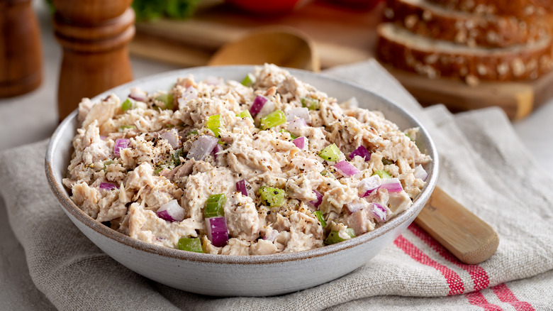 tuna salad with celery and red onion in a bowl 