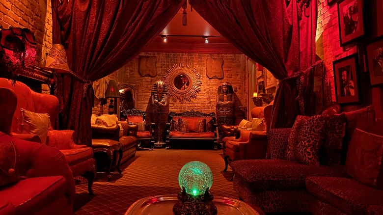 Glowing crystal ball in seance lounge