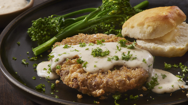 chicken fried steak with biscuit