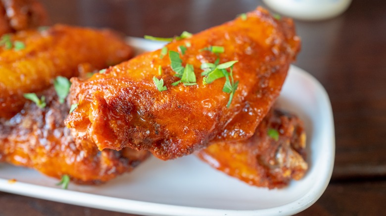 Buffalo chicken wings with herbs