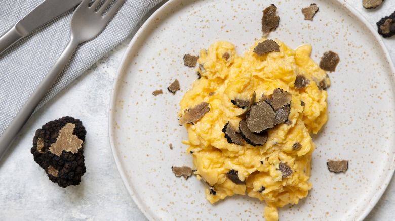 Soft scrambled egg with shaved fresh truffle