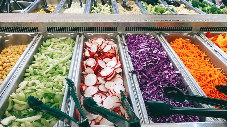 fresh vegetables at supermarket salad bar