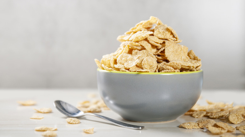Bowl of cornflakes with spoon