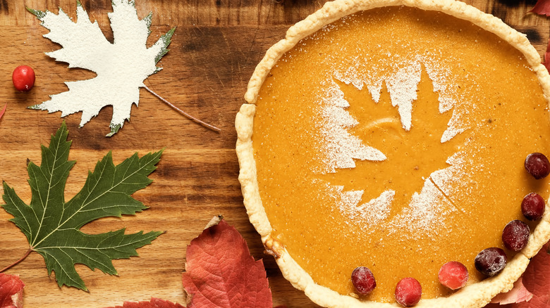 Pumpkin or sweet potato pie with maple leaf powdered sugar stencil