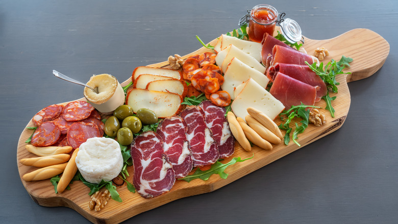 charcuterie board meats and cheeses 