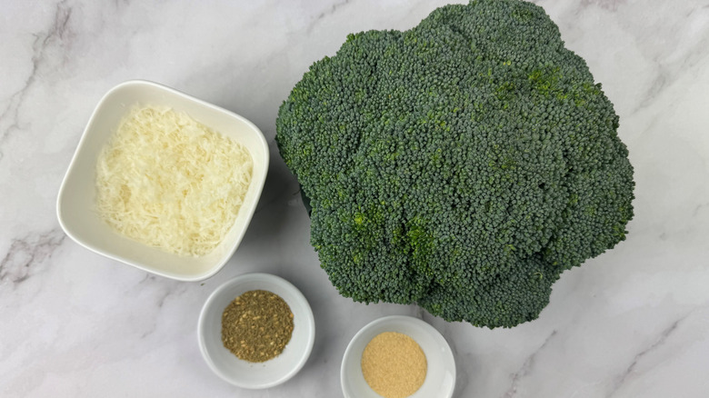 head of broccoli with parmesan and seasonings