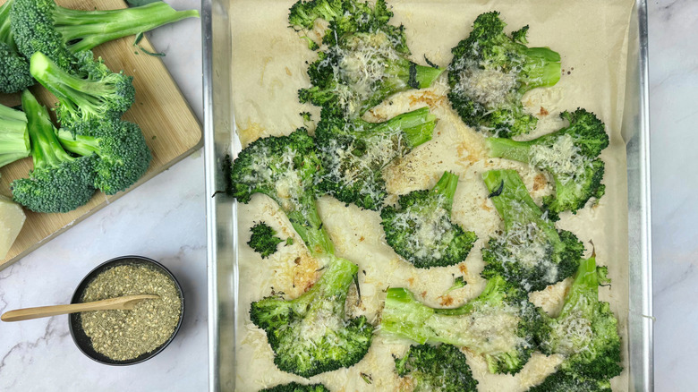 smashed za'atar parmesan broccoli on baking sheet