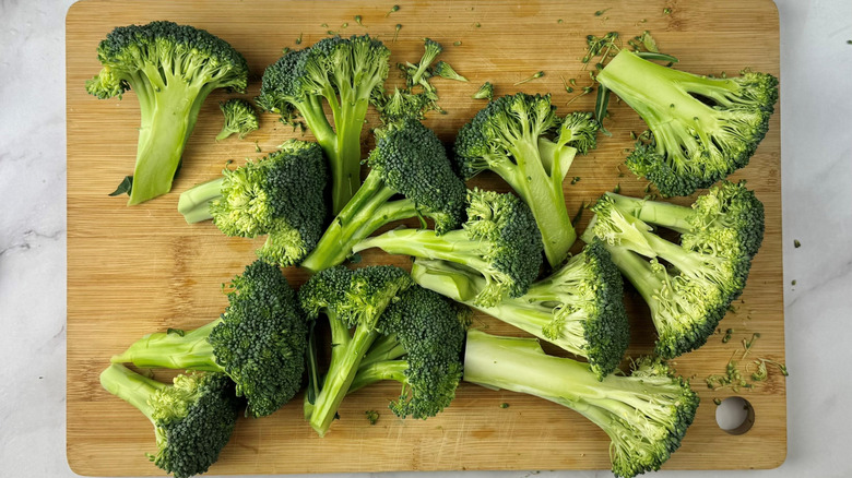 broccoli florets on cutting board