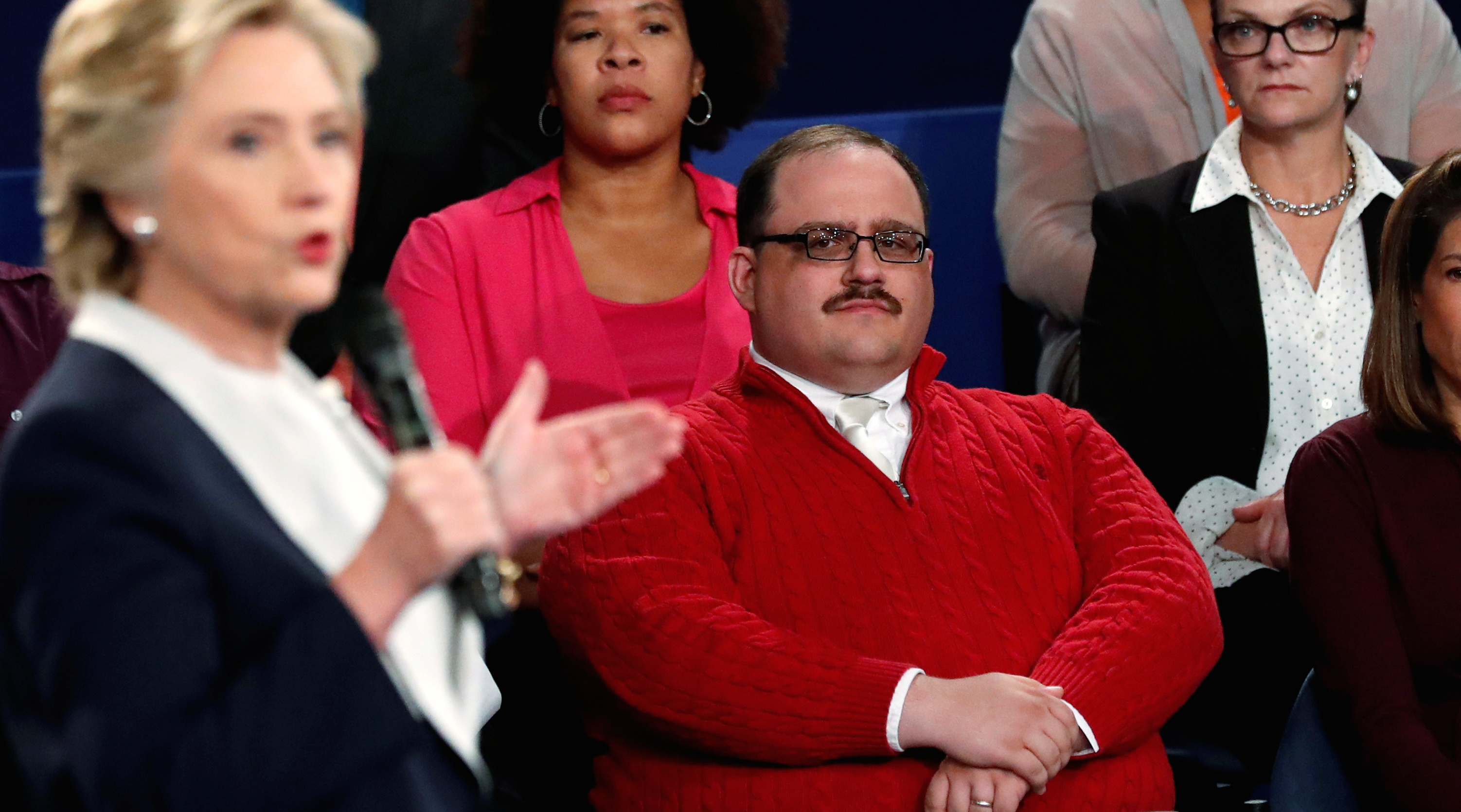 Ken Bone listens to Democratic presidential nominee Clinton debate Republican nominee Trump during their presidential debate in St. Louis