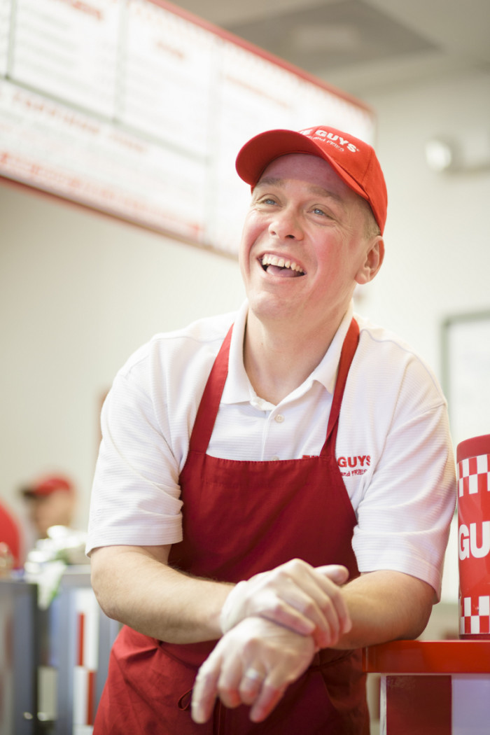 The Real Reason You Always See Bags Of Potatoes Inside Five Guys